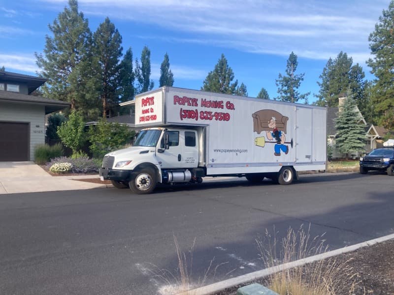 Popeye Moving & Storage moving truck parked in a Los Angeles neighborhood - call (310) 823-9510