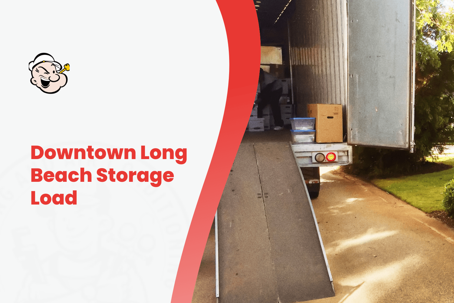 Moving truck loaded with boxes and storage items on residential driveway ramp