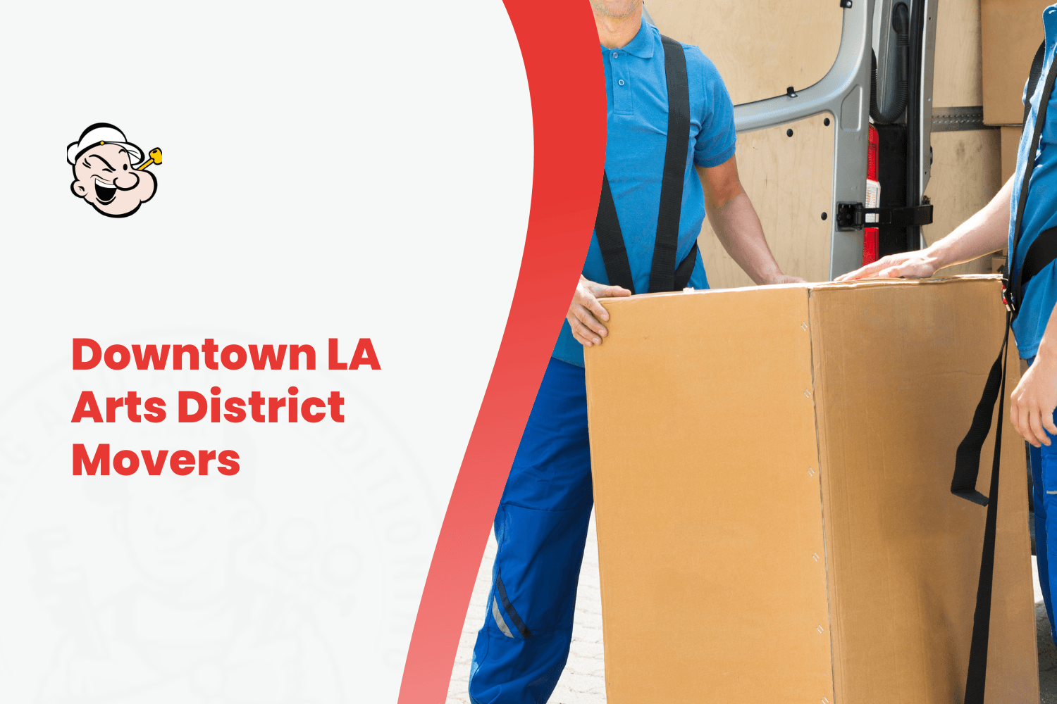 Two movers in blue uniforms loading large cardboard box into moving van